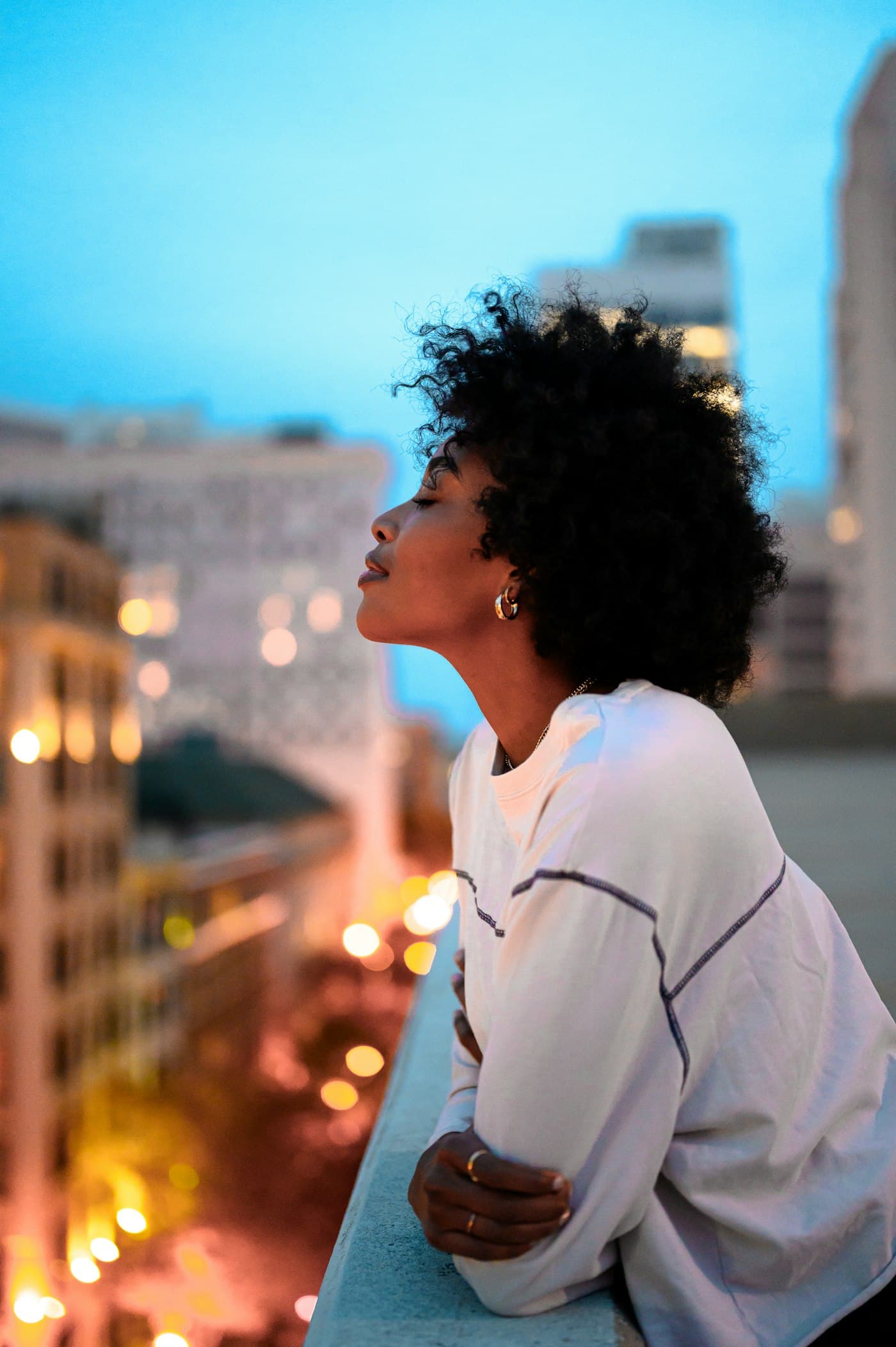 Woman pausing in the city